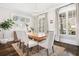 Formal dining room with hardwood floors, natural light, and stylish chandelier at 2877 Elliott Ne Cir, Atlanta, GA 30305