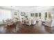Spacious living room with hardwood floors, fireplace, and sliding doors to outdoor space at 2877 Elliott Ne Cir, Atlanta, GA 30305
