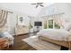 Bright main bedroom with vaulted ceilings, hardwood floors, and ample natural light at 2877 Elliott Ne Cir, Atlanta, GA 30305