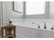 Close up of soaking tub with updated fixtures at 3894 Dunaire Dr, Stone Mountain, GA 30083