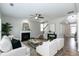Cozy living room with fireplace and stairs, providing a warm, inviting space at 3894 Dunaire Dr, Stone Mountain, GA 30083