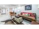Inviting basement living area with comfortable sofa, unique ottoman, and decorative rug offers a relaxed atmosphere at 417 Lynnhaven Sw Dr, Atlanta, GA 30310