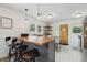Bright kitchen with butcher block countertop island, natural light, and wood door at 417 Lynnhaven Sw Dr, Atlanta, GA 30310