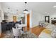 Open-concept living room with hardwood floors, lots of light and a connected kitchen at 417 Lynnhaven Sw Dr, Atlanta, GA 30310