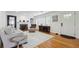 Bright living room featuring hardwood floors, neutral colors and large windows at 417 Lynnhaven Sw Dr, Atlanta, GA 30310