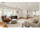 Bright living room featuring hardwood floors, neutral colors and large windows at 417 Lynnhaven Sw Dr, Atlanta, GA 30310