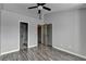 Spacious bedroom with doors leading to bathroom and closet at 5987 Turfway Park Ct, Sugar Hill, GA 30518