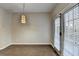 Dining Area with tile floor and sliding glass doors at 5987 Turfway Park Ct, Sugar Hill, GA 30518