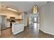 Well-lit kitchen featuring tile floors, granite counters, and stainless steel appliances at 5987 Turfway Park Ct, Sugar Hill, GA 30518