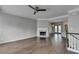 Spacious living room with a fireplace and tile flooring at 5987 Turfway Park Ct, Sugar Hill, GA 30518