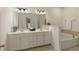 Bright bathroom features a double vanity with ample storage and a soaking tub at 1962 Bainbridge Ln, Atlanta, GA 30345