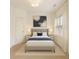 Cozy bedroom with a comfortable bed, neutral decor, and soft, natural lighting at 1962 Bainbridge Ln, Atlanta, GA 30345