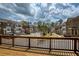 Charming townhome community view showcasing manicured lawns and tree-lined streets from wood deck at 1962 Bainbridge Ln, Atlanta, GA 30345