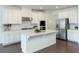 Bright kitchen featuring white cabinets, stainless steel appliances, and a large island at 1962 Bainbridge Ln, Atlanta, GA 30345