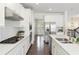 Modern kitchen featuring stainless steel appliances, white subway tile backsplash, and quartz countertops, creating a sleek culinary space at 1962 Bainbridge Ln, Atlanta, GA 30345