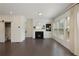 Inviting living room features fireplace, built-in shelves, and a barn door, offering cozy ambiance with practical design elements at 1962 Bainbridge Ln, Atlanta, GA 30345