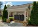 Mailboxes under a shelter with stone pillars surrounded by lush landscaping at 1962 Bainbridge Ln, Atlanta, GA 30345