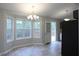 Bright eat-in kitchen with large windows and deck access at 301 Thorn Thicket Dr, Rockmart, GA 30153