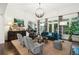 Spacious living room filled with natural light from large windows, complemented by elegant furnishings and decor at 135 High Point Walk, Atlanta, GA 30342