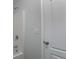 Close-up of a shower and a door in a bathroom at 1498 Scenic Pines Dr, Lawrenceville, GA 30044
