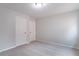 Bedroom with neutral carpet and two doors at 1498 Scenic Pines Dr, Lawrenceville, GA 30044