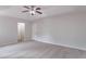 Spacious bedroom with neutral carpet and ample closet space at 1498 Scenic Pines Dr, Lawrenceville, GA 30044