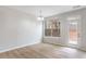 Dining room featuring hardwood floors and backyard access at 1498 Scenic Pines Dr, Lawrenceville, GA 30044