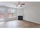 Cozy living room with fireplace and door to the backyard at 1498 Scenic Pines Dr, Lawrenceville, GA 30044