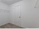 Walk-in closet featuring wire shelving and a door to another room at 1498 Scenic Pines Dr, Lawrenceville, GA 30044