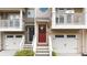 Townhome front door with inviting entrance, seasonal wreath, and covered porch at 1741 Liberty Nw Pkwy, Atlanta, GA 30318
