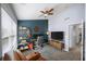 Inviting home office with accent wall, fan, functional layout, and comfortable leather chair at 1741 Liberty Nw Pkwy, Atlanta, GA 30318