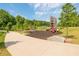 Outdoor playground with slides and climbing structures amid lush greenery at 1741 Liberty Nw Pkwy, Atlanta, GA 30318