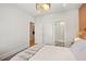 This bedroom includes easy access to laundry and bathroom amenities at 2200 Cortland Rd, Milton, GA 30009