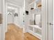 Entryway mudroom with white bench seating and storage cubbies at 2200 Cortland Rd, Milton, GA 30009