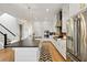 Contemporary kitchen with stainless appliances, eat-in island, and plenty of storage at 2200 Cortland Rd, Milton, GA 30009