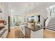 Modern kitchen with large island, stainless steel appliances, and eat-in dining area at 2200 Cortland Rd, Milton, GA 30009