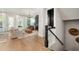 Open-concept living room with hardwood floors and ample natural light at 2200 Cortland Rd, Milton, GA 30009