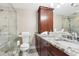 A full bathroom offering granite countertops and a glass-enclosed shower at 3481 Lakeside Ne Dr # 2203, Atlanta, GA 30326