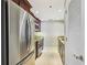 Galley kitchen featuring stainless steel appliances, granite countertops and updated cabinetry at 3481 Lakeside Ne Dr # 2203, Atlanta, GA 30326