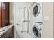 A convenient stacked washer and dryer is found in this home's laundry room at 3481 Lakeside Ne Dr # 2203, Atlanta, GA 30326