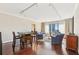 Spacious living area features hardwood floors, natural light, and a dining area with seating for four at 3481 Lakeside Ne Dr # 2203, Atlanta, GA 30326