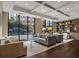 A welcoming lobby with comfortable furniture and library shelves with books at 3481 Lakeside Ne Dr # 2203, Atlanta, GA 30326