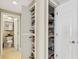 Organized pantry with shelving and a full-sized storage closet providing ample space at 3481 Lakeside Ne Dr # 2203, Atlanta, GA 30326