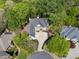 Stately home with circular driveway, mature trees and manicured landscaping, nestled in a desirable neighborhood at 545 Slane Trce, Roswell, GA 30076