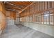 Unfinished basement with concrete floor, framed walls, and natural light, ready to customize at 545 Slane Trce, Roswell, GA 30076