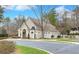 Elegant clubhouse with refined architectural details, manicured landscaping, and a welcoming entrance, serving as a social hub at 545 Slane Trce, Roswell, GA 30076