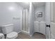 Small bathroom featuring a toilet, shower with curtain, mirror, and sink at 904 Little River Ln, Woodstock, GA 30189
