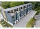 Aerial view of modern townhomes with rooftop decks and manicured landscaping at 1570 Flat Shoals Se Rd # 4, Atlanta, GA 30316