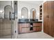 Stylish bathroom featuring dual sinks, a glass shower, wood cabinets and modern fixtures at 1570 Flat Shoals Se Rd # 4, Atlanta, GA 30316