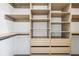 Spacious closet featuring custom shelving, drawers, and hanging rods for optimal storage and organization at 1570 Flat Shoals Se Rd # 4, Atlanta, GA 30316